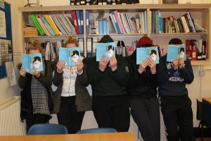 Students reading a book