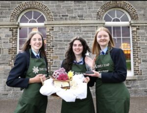 Three students with soap samples. 