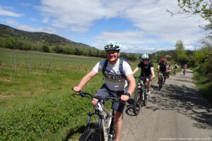 People cycling in the countryside. 