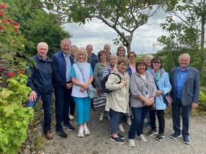Group of people in a garden.