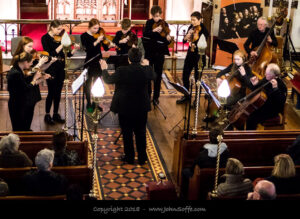 Chamber Orchestra playing music.